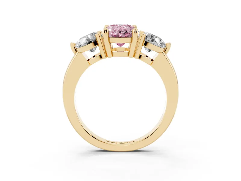 Fancy Pink Oval Cut Diamond Three-Stone Ring Set in Yellow gold with Prong Setting and Classic Band