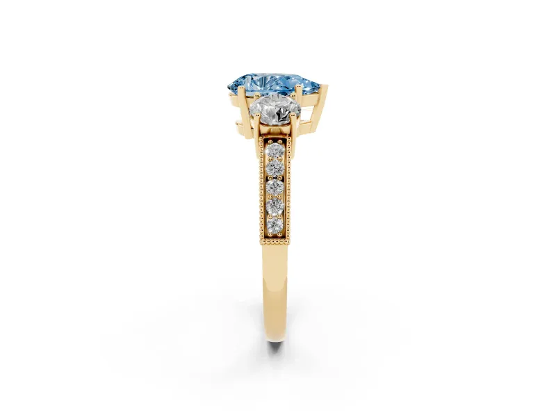 Pear-Shaped Three Stone Engagement Ring Setting for a Fancy Blue Lab-Grown Diamond | Graduated Pave Band | Yellow Gold