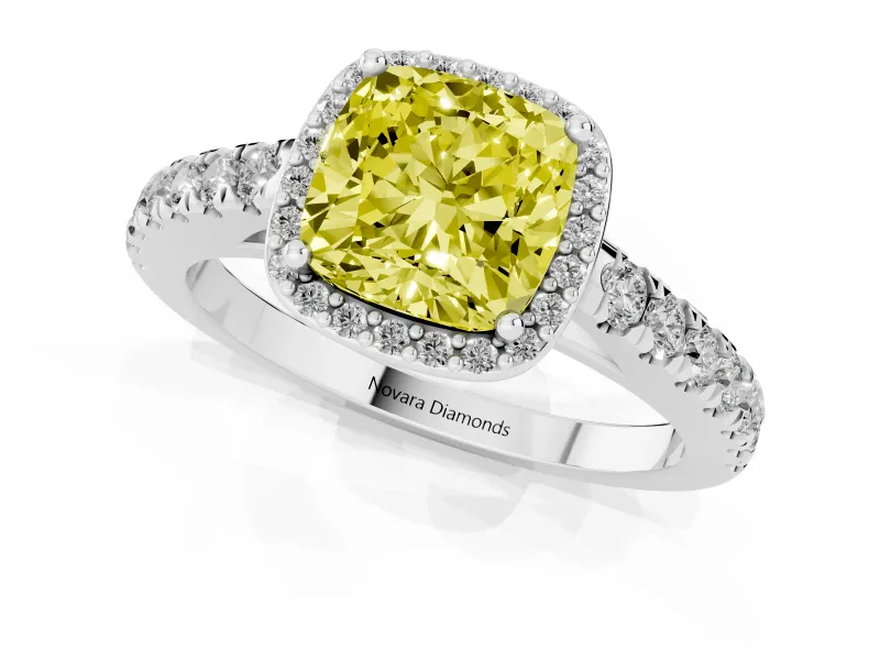 Fancy Yellow Cushion Cut Diamond Halo Engagement Ring Set in White gold with Pavé Band and Prong Setting