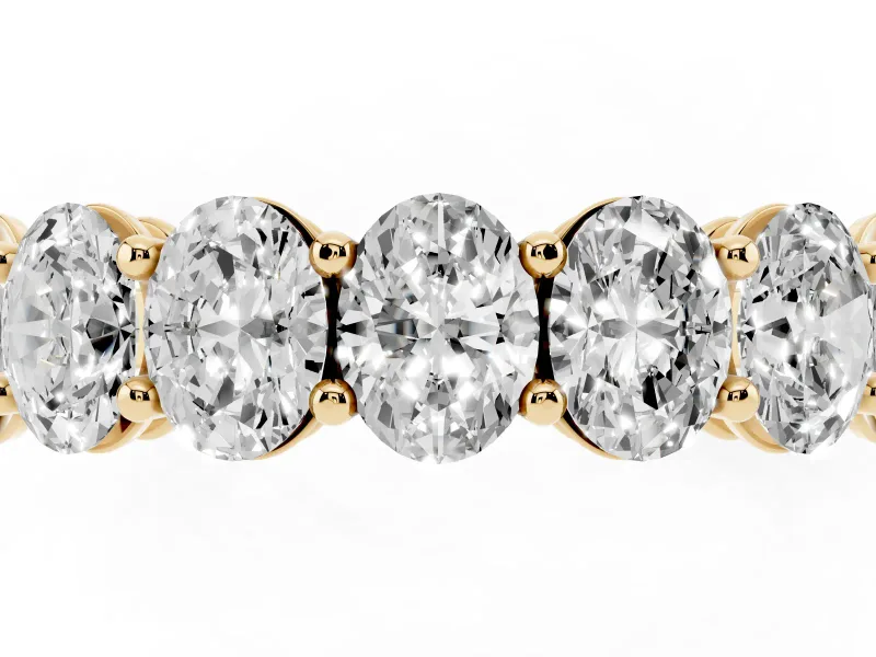 Oval Diamond Eternity Band Set in Yellow gold with Shared Prongs
