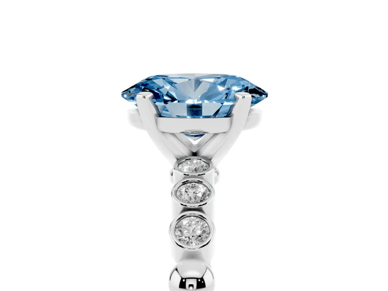 Fancy Blue Oval Cut Diamond Solitaire Engagement Ring Set in Platinum with Bezel Accents on Beaded Band