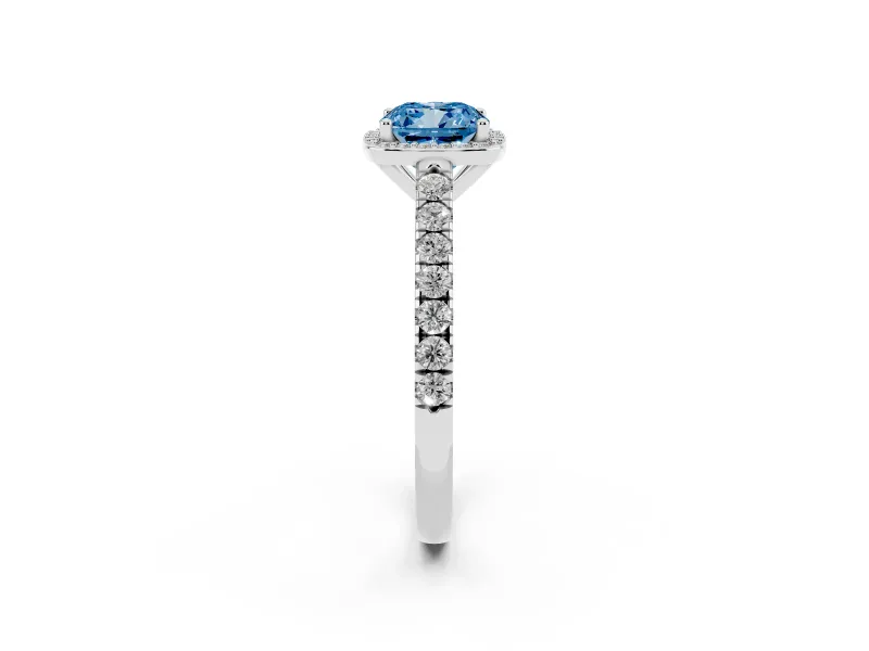 Fancy Blue Cushion Cut Diamond Halo Engagement Ring Set in White gold with Pavé Band and Prong Setting