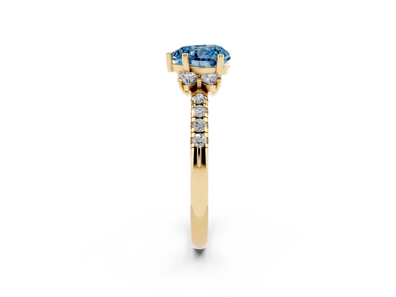 Heart-Shaped Side Stone Engagement Ring Setting for a Fancy Blue Lab-Grown Diamond | Pave Band | Yellow Gold