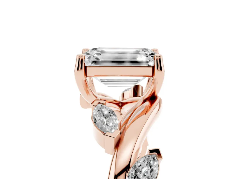 Emerald Cut Diamond Solitaire Ring Set in Rose gold with Twisted Marquise Accent Band