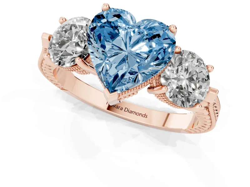 Fancy Blue Heart Cut Diamond Three-Stone Ring Set in Rose gold with Milgrain Band