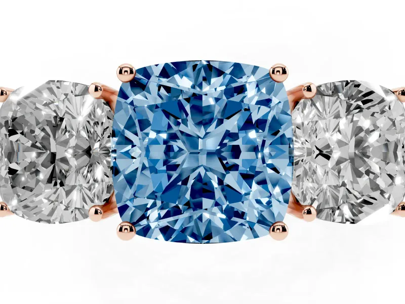 Fancy Blue Cushion Cut Diamond Three-Stone Ring Set in Rose gold with Textured Band