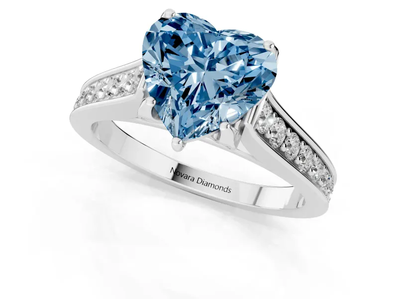 Heart-Shaped Graduated Pavé Engagement Ring Setting for a Fancy Blue Lab-Grown Diamond | Platinum