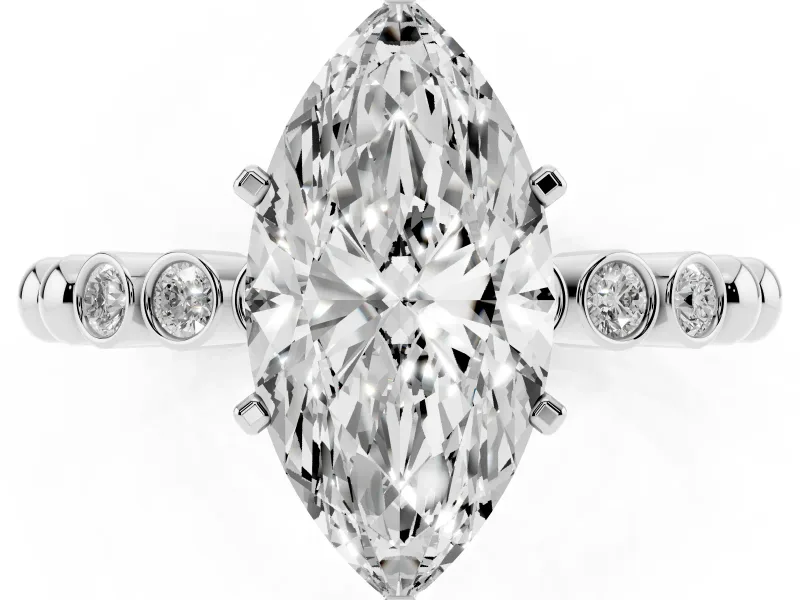 Marquise Cut Diamond Solitaire Engagement Ring Set in Platinum with Bezel Accents on Beaded Band