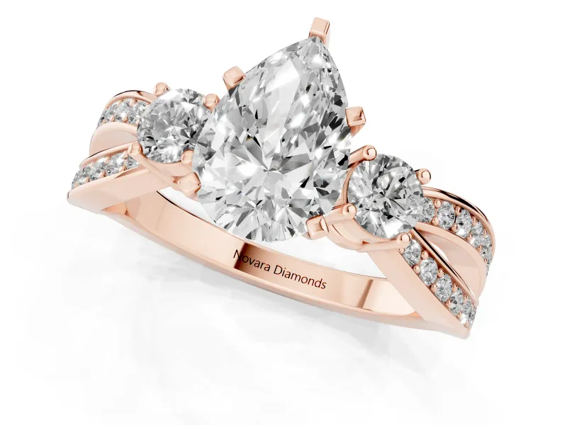 Three-Stone Pear Cut Diamond Twist Band Ring Set in Rose gold with Pavé Accents and Prong Setting