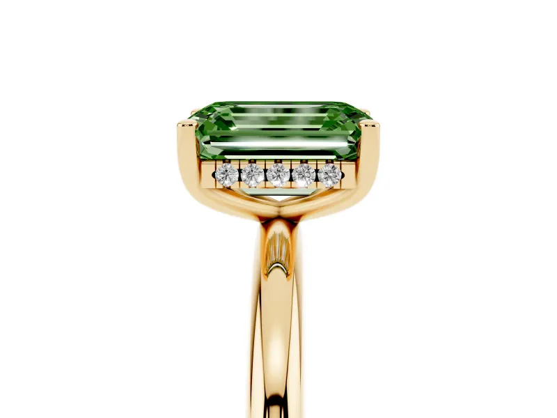 Fancy Green Emerald Cut Diamond Solitaire Engagement Ring Set in Yellow gold with Prong Setting and Polished Band