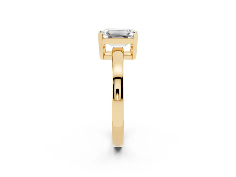 Emerald Cut Diamond Solitaire Ring Set in Yellow gold with Prong Head and Smooth Polished Band