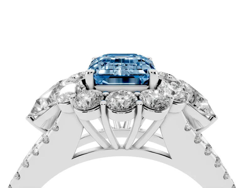 Fancy Blue Emerald Cut Diamond Halo Split Shank Engagement Ring Set in Silver with Prong-Held Center Stone