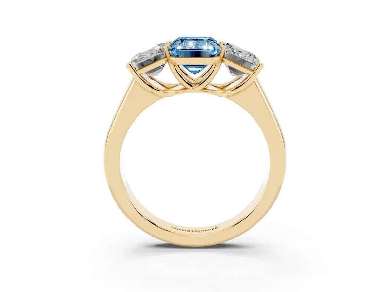 Emerald Cut Three Stone Engagement Ring Setting for a Fancy Blue Lab-Grown Diamond | Basket Prong Heads | Yellow Gold
