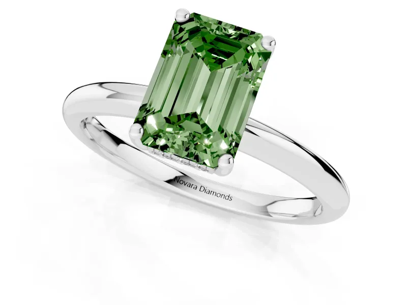 Fancy Green Emerald Cut Diamond Solitaire Engagement Ring Set in Platinum with Prong Setting and Polished Band