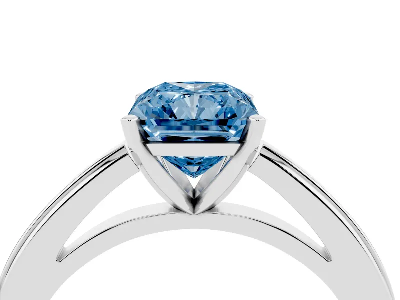 Fancy Blue Radiant Cut Diamond Solitaire Ring Set in Silver with Prong Setting and Classic Band