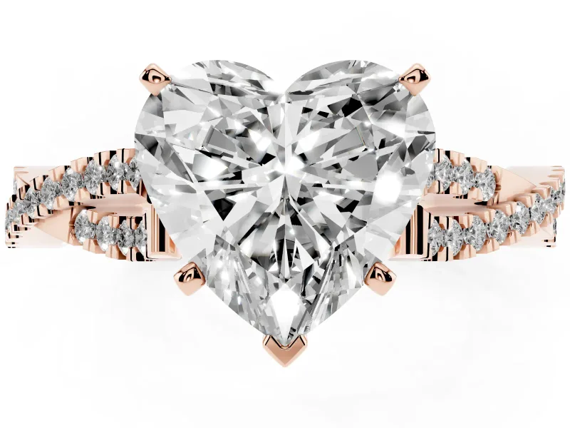 Heart Cut Diamond Solitaire Engagement Ring Set in Rose gold with Twisted Pavé Band and Prong Setting