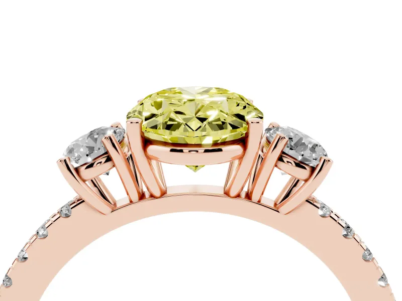 Fancy Yellow Oval Cut Diamond Three-Stone Ring Set in Rose gold with Pavé Band and Graduated Sides