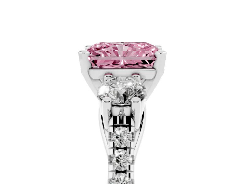 Fancy Pink Three-Stone Radiant Cut Diamond Pavé Band Ring Set in Platinum with Prong-Set Trio