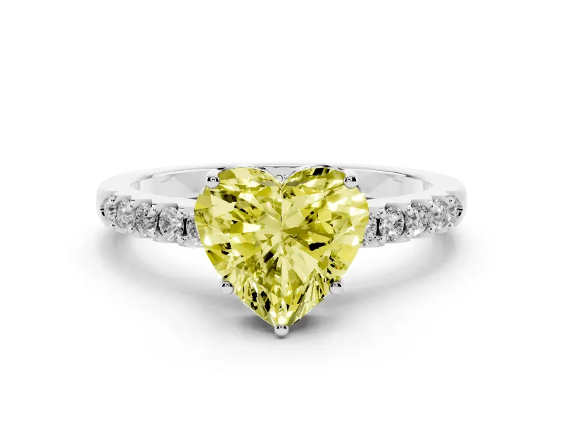 Fancy Yellow Heart Cut Diamond Solitaire Engagement Ring Set in White gold with Pavé Band and Prong Setting
