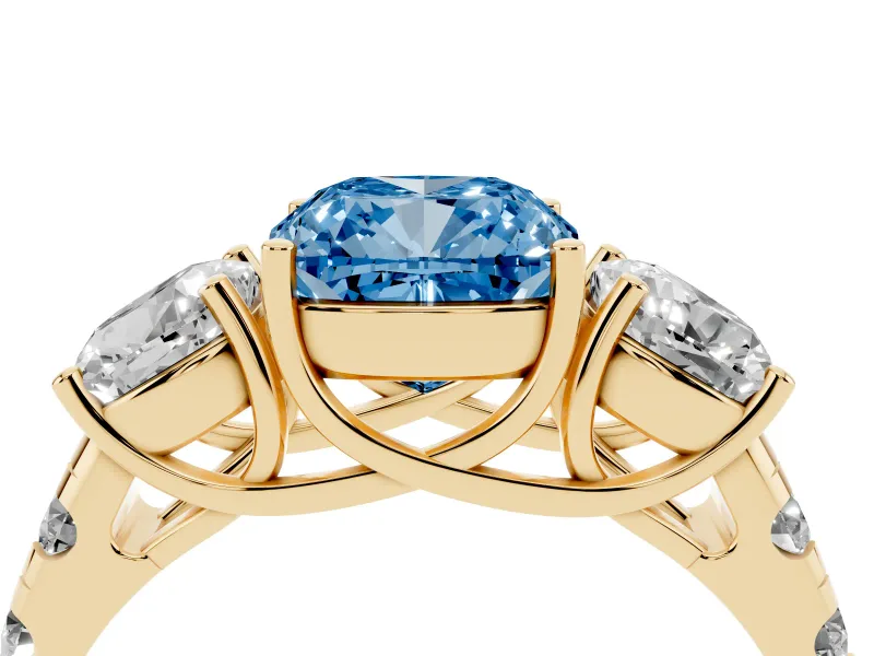 Cushion Cut Three Stone Engagement Ring Setting for a Fancy Blue Lab-Grown Diamond | Accented Shoulders | Yellow Gold