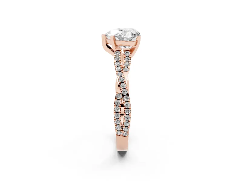 Heart Cut Diamond Solitaire Engagement Ring Set in Rose gold with Twisted Pavé Band and Prong Setting