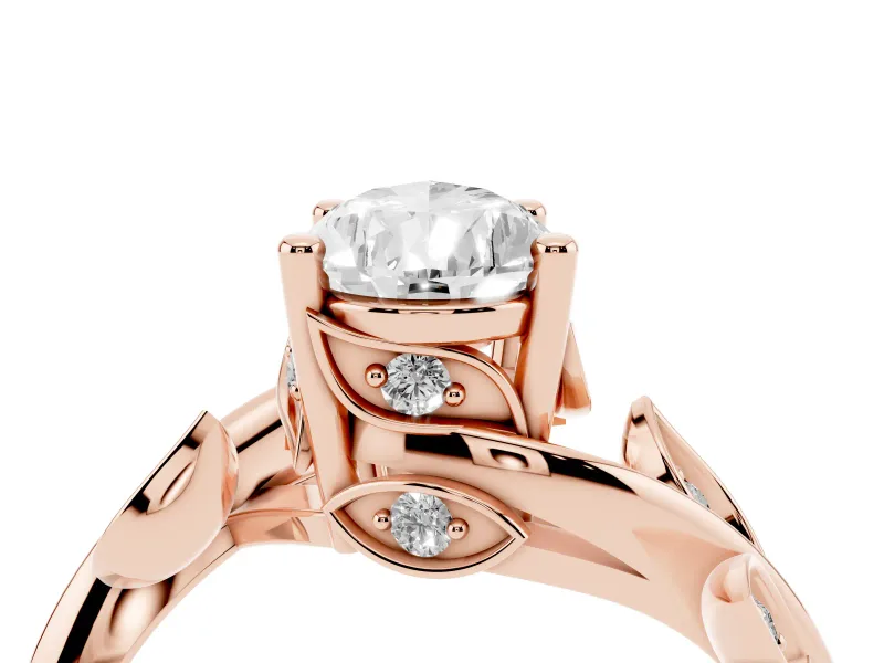 Pear Cut Diamond Solitaire Twist Engagement Ring Set in Rose gold with Pavé Leaf Accents