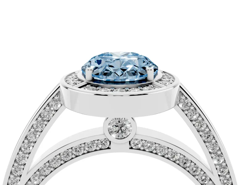 Fancy Blue Oval Cut Diamond Halo Pavé Split Shank Ring Set in White gold with Prong Setting