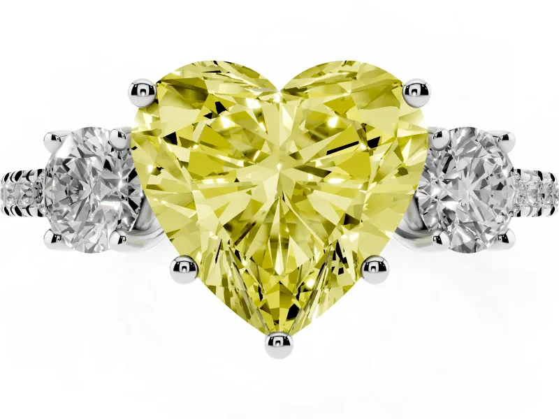 Fancy Yellow Heart Cut Diamond Three-Stone Ring Set in Silver with Pavé Band and Graduated Sides