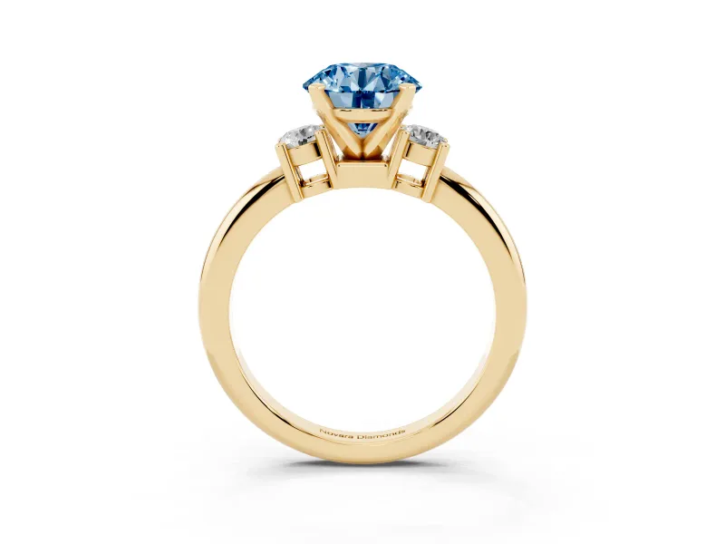 Fancy Blue Three-Stone Round Cut Diamond Ring Set in Yellow gold with Prong Setting and Plain Band