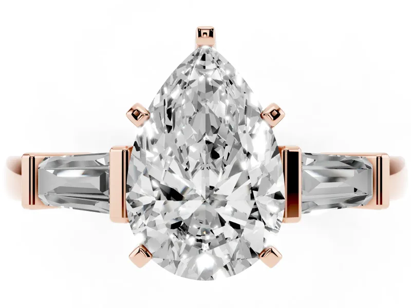 Pear Cut Diamond Solitaire Ring Set in Rose gold with Tapered Baguette Accents and Prong Setting
