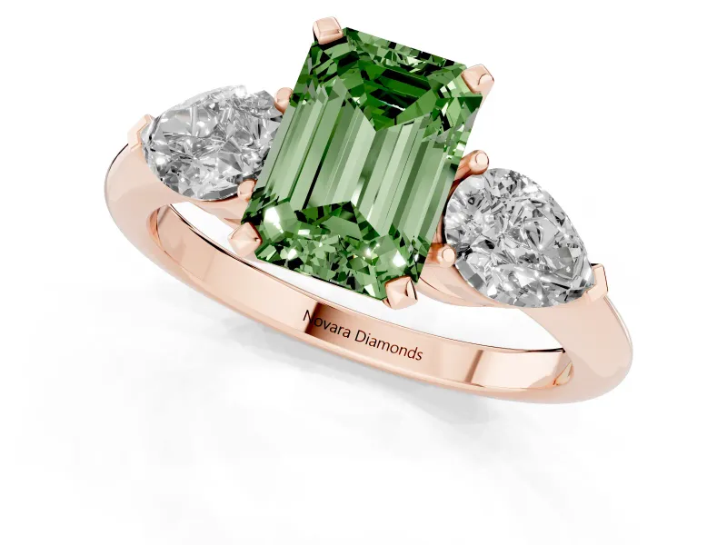Fancy Green Three-Stone Emerald Cut Diamond Ring Set in Rose gold with Pear Side Stones and Prong Setting