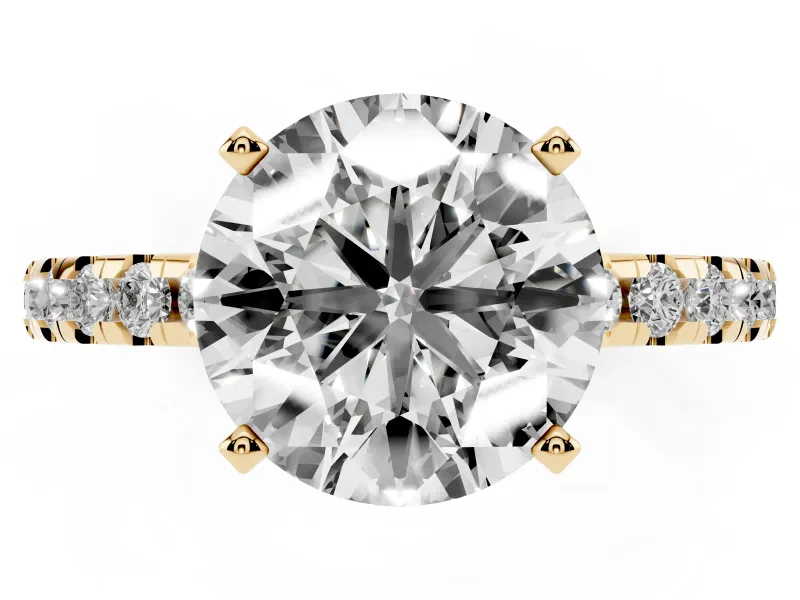 0.5 Carat Round Cut Pavé Solitaire Ring Set in Yellow gold with Round Band Accents and Prong Setting