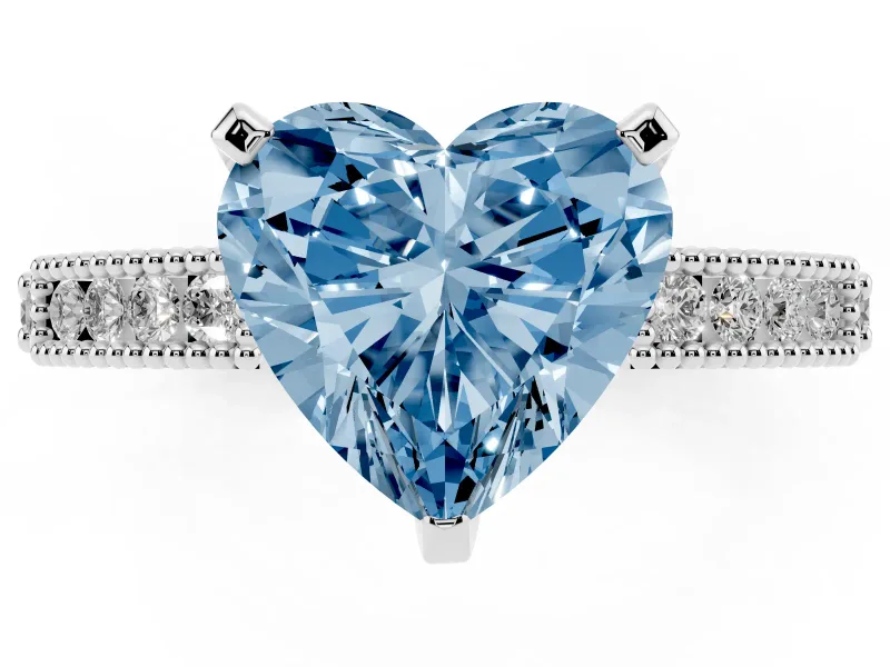 Fancy Blue Heart Cut Diamond Solitaire Ring Set in Platinum with Slim Pavé Band and Prong Setting
