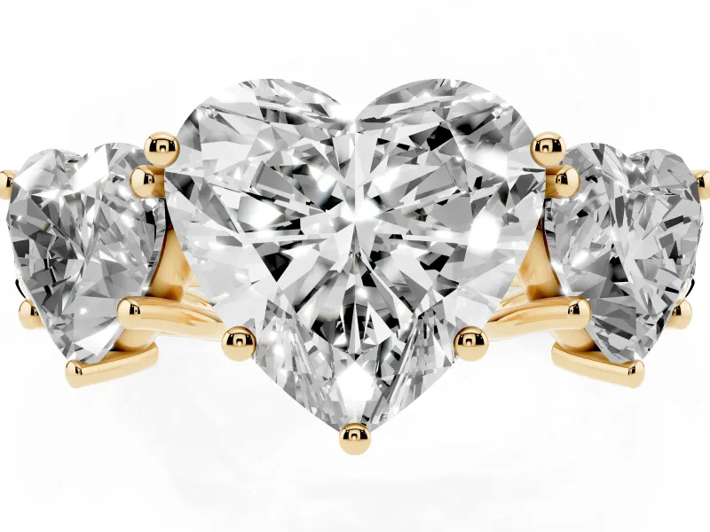 Heart Cut Diamond Three-Stone Ring Set in Yellow gold with Pavé Band