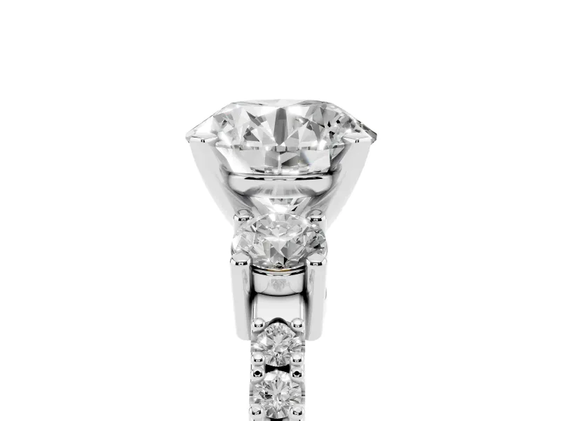 Three-Stone Round Cut Diamond Pavé Band Ring Set in White gold with Prong Setting