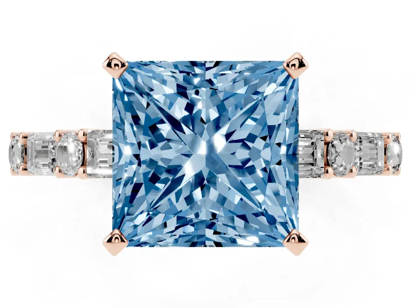 Fancy Blue Princess Cut Diamond Solitaire Set in Rose gold with Side Baguettes and Channel Set Band