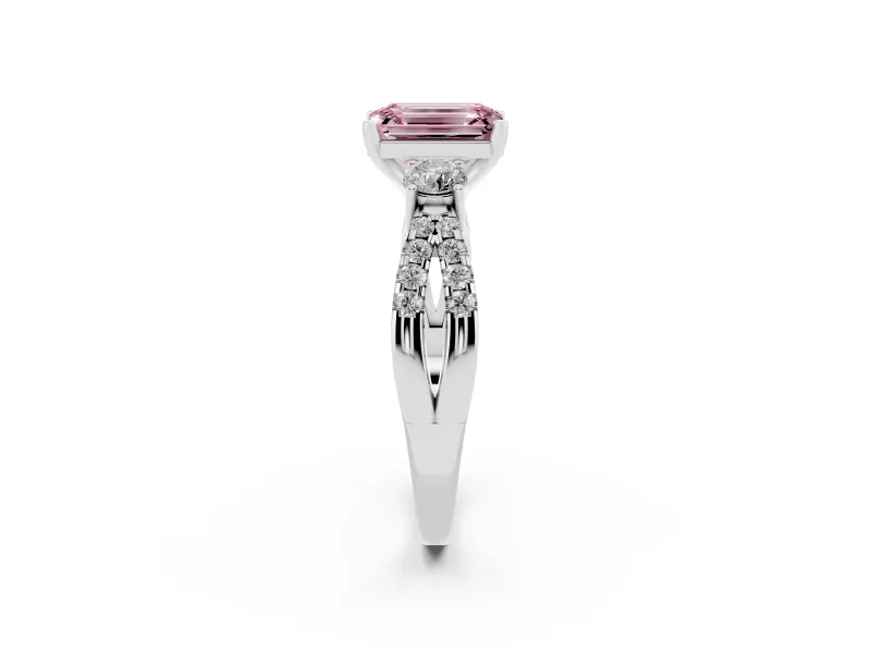 Fancy Pink Emerald Cut Diamond Three-Stone Ring Set in White gold with Pavé Split Shank and Prong Setting