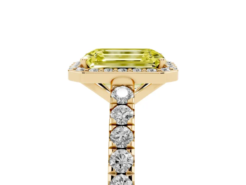 Fancy Yellow Emerald Cut Diamond Halo Engagement Ring Set in Yellow gold with Pavé Band and Prong Setting