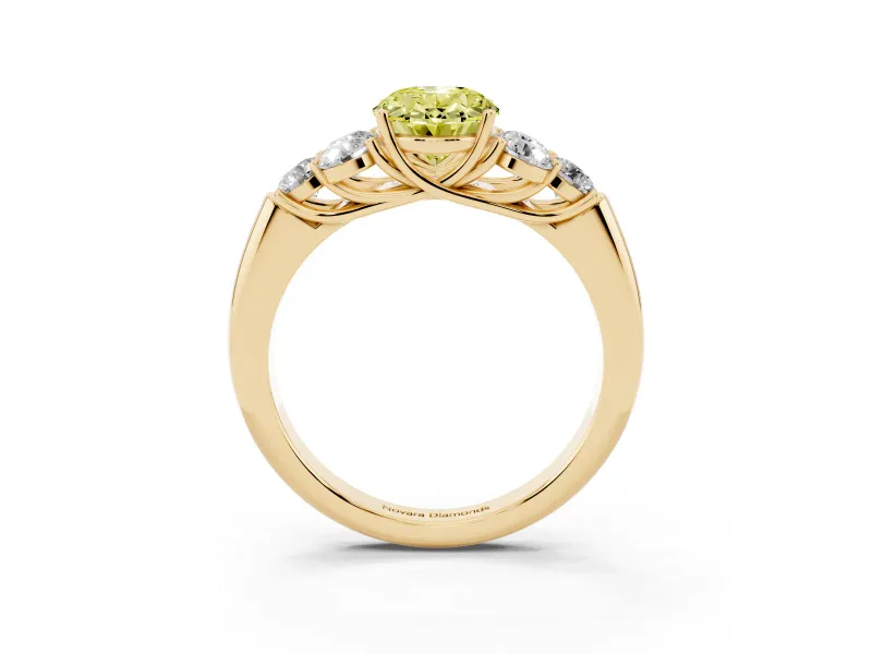 Fancy Yellow Oval Cut Diamond Cluster Ring Set in Yellow gold with Round Accent Stones and Prong Setting on a Plain Band