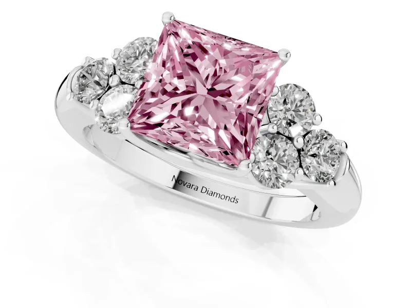 Fancy Pink Princess Cut Diamond Cluster Ring Set in White gold with Round Accent Stones and Prong Setting on a Plain Band