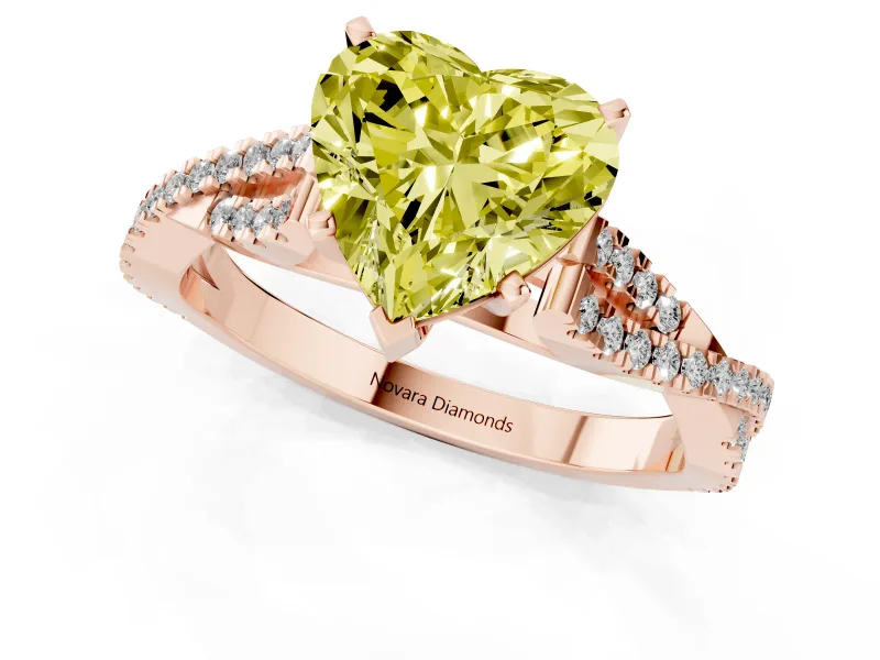 Fancy Yellow Heart Cut Diamond Solitaire Engagement Ring Set in Rose gold with Twisted Pavé Band and Prong Setting