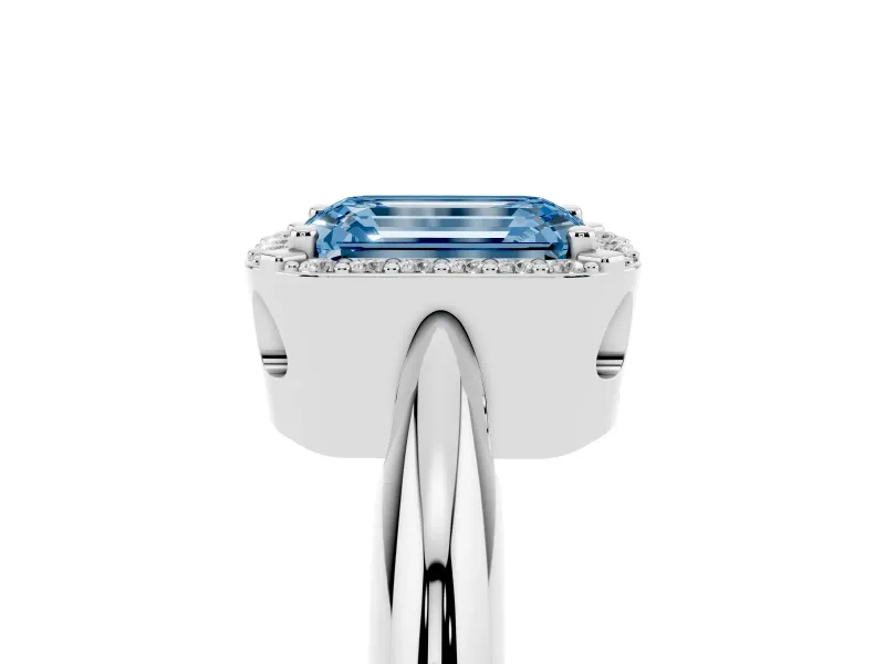 Fancy Blue Emerald Cut Diamond Halo Engagement Ring Set in White gold with Plain Split Shank and Prong Setting
