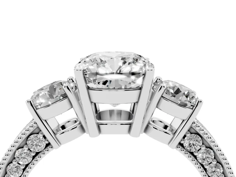 Cushion Cut Diamond Three-Stone Ring Set in White gold with Round Side Stones and Pavé Band