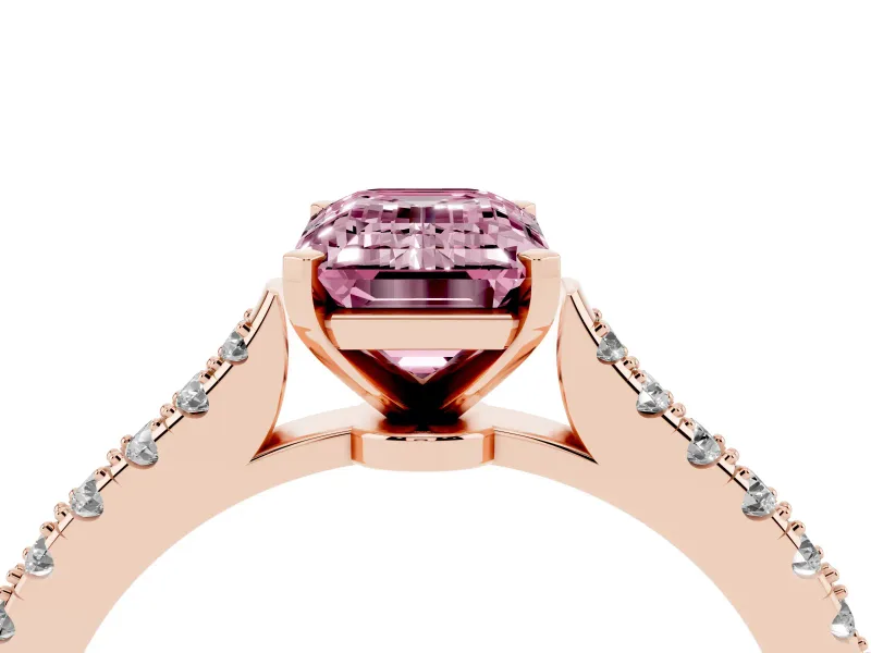 Fancy Pink Emerald Cut Diamond Solitaire Engagement Ring Set in Rose gold with Delicate Pavé Band and Prong Setting