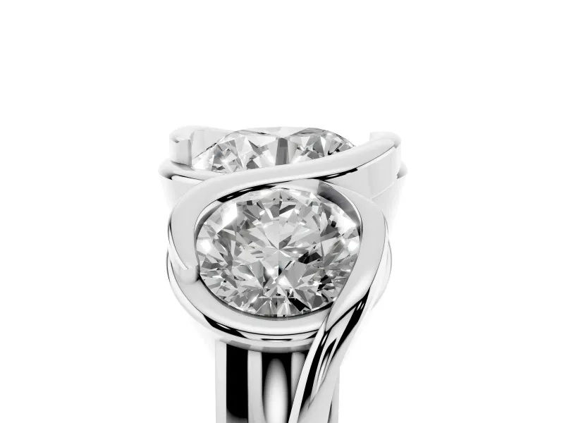 Round Cut Diamond Three-Stone Wave Ring Set in White gold with Bezel Setting