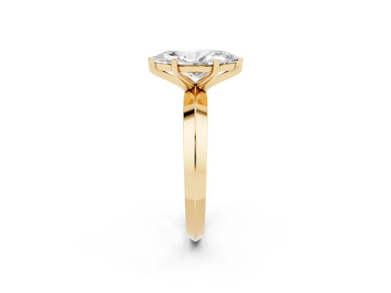Marquise Cut Diamond Solitaire Engagement Ring Set in Yellow gold with Flat Band and Prong Setting