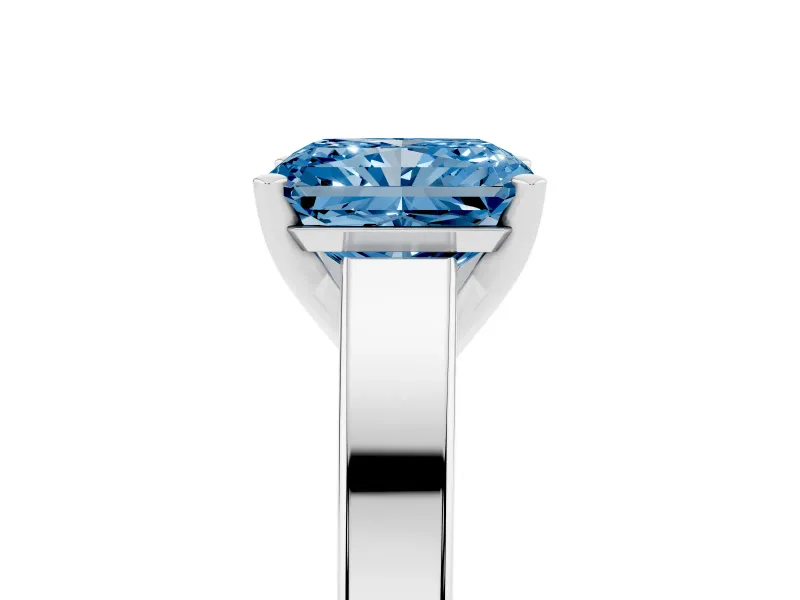 Fancy Blue Radiant Cut Diamond Solitaire Engagement Ring Set in Platinum with Prong Setting and Tapered Band