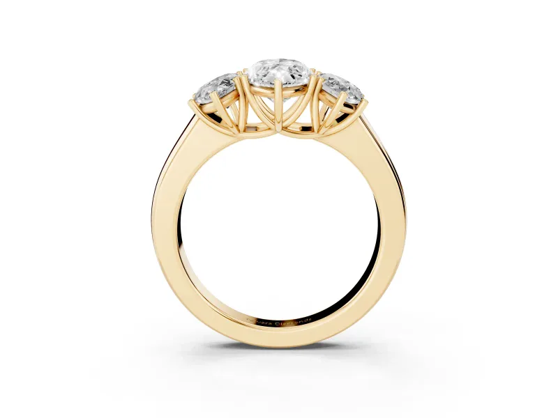 Three-Stone Marquise Cut Diamond Ring Set in Yellow gold with Matching Prong Settings and Plain Band