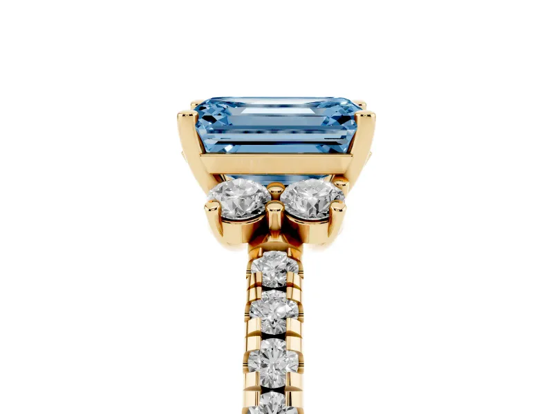Emerald Cut Side Stone Engagement Ring Setting for a Fancy Blue Lab-Grown Diamond | Pave Band | Yellow Gold