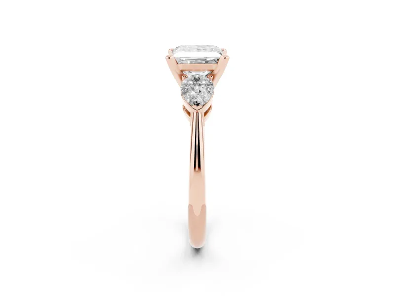 Three-Stone Princess Cut Diamond Ring Set in Rose gold with Pear Side Stones and Prong Setting